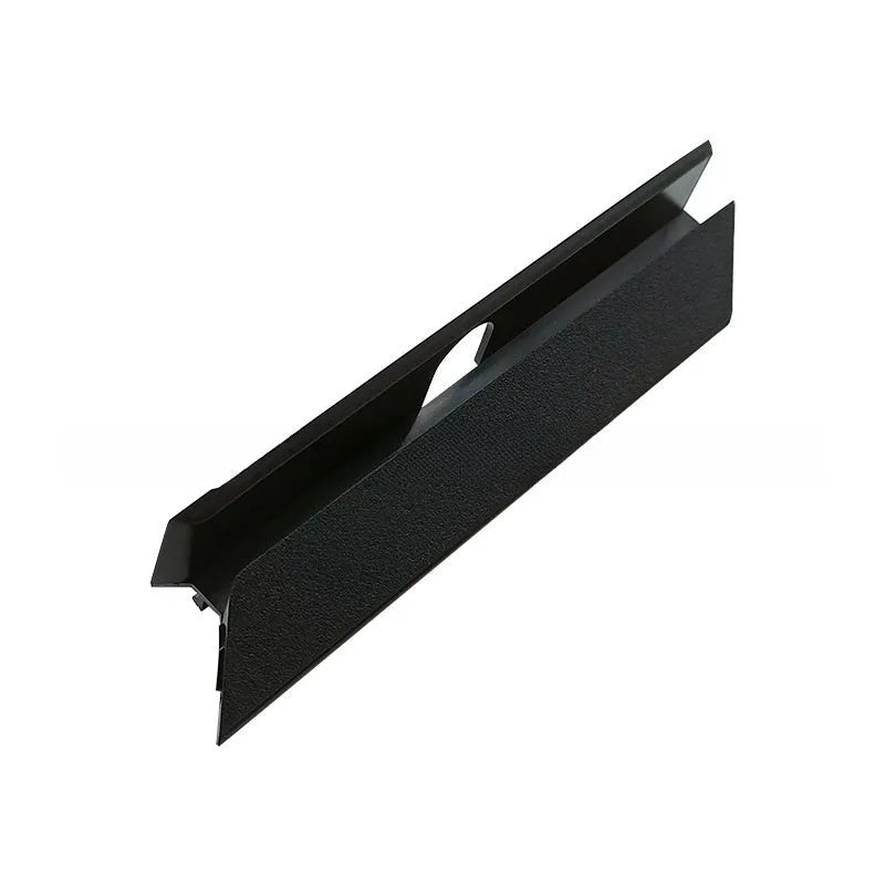 Black PS4 Pro hard drive bottom cover and internal service parts including a baffle and block strip.