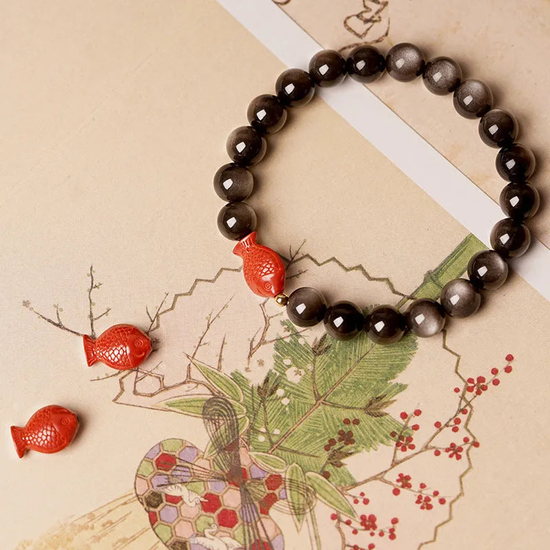 Natural obsidian crystal bracelet with round beads and cinnabar accents in three size options