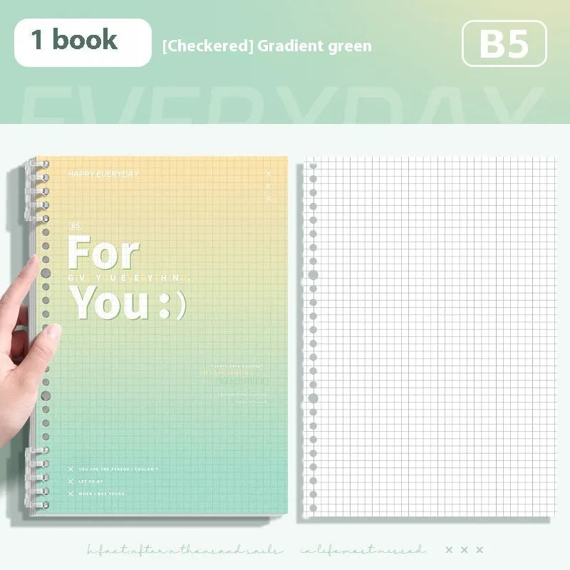 Removable coil gradient notepad in blue, green, pink, or purple with grid paper.
