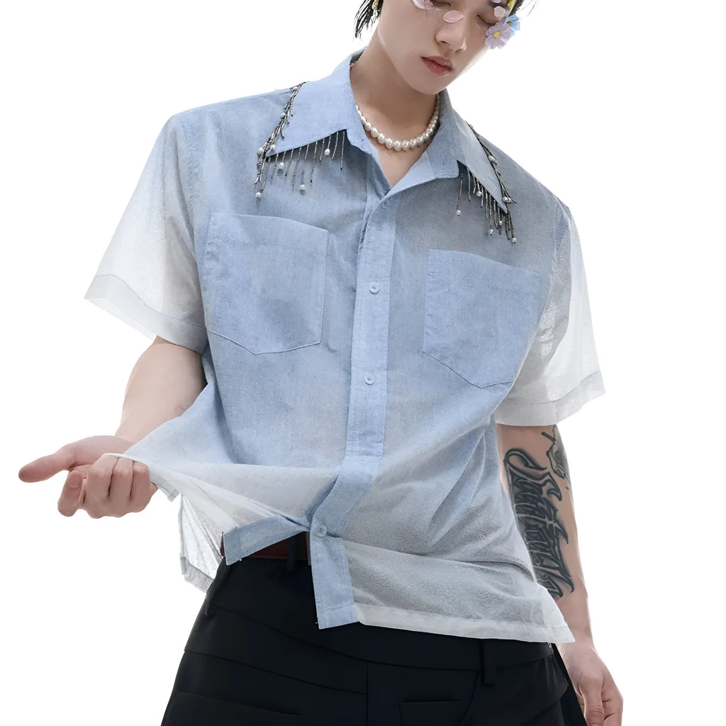Man modelling a loose fit blue and white gradient shirt with quilted detailing and short sleeves.