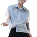 Man modelling a loose fit blue and white gradient shirt with quilted detailing and short sleeves.