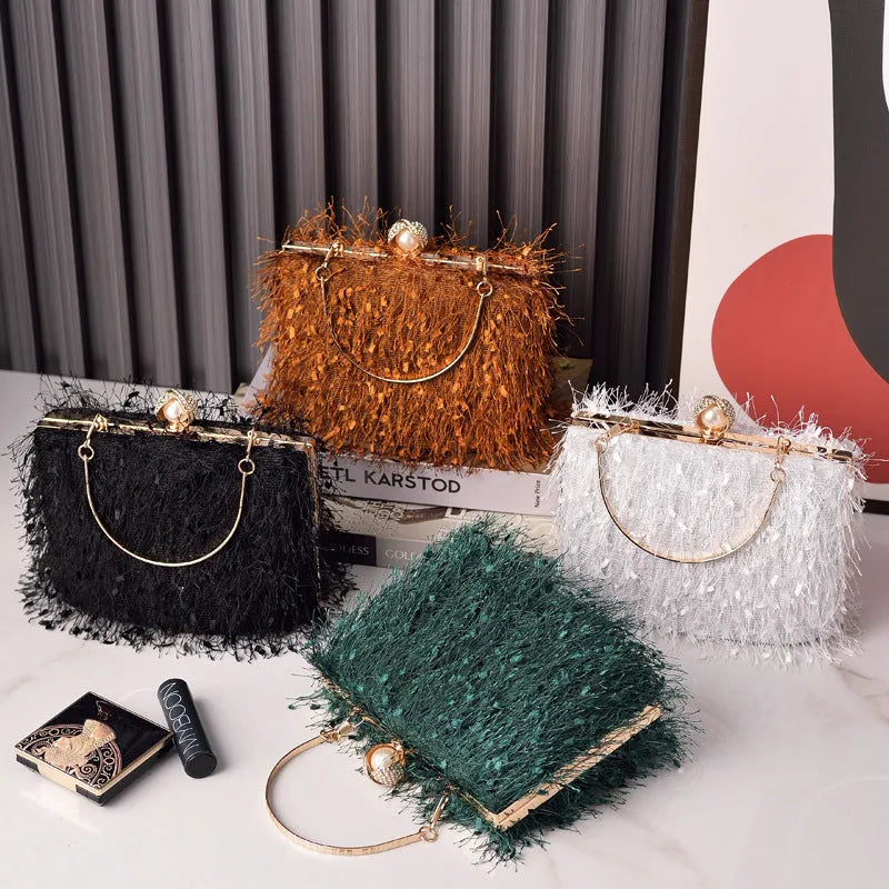 Tassel handbag for women with lock closure and tassel detail, cylinder shape, available in multiple colours