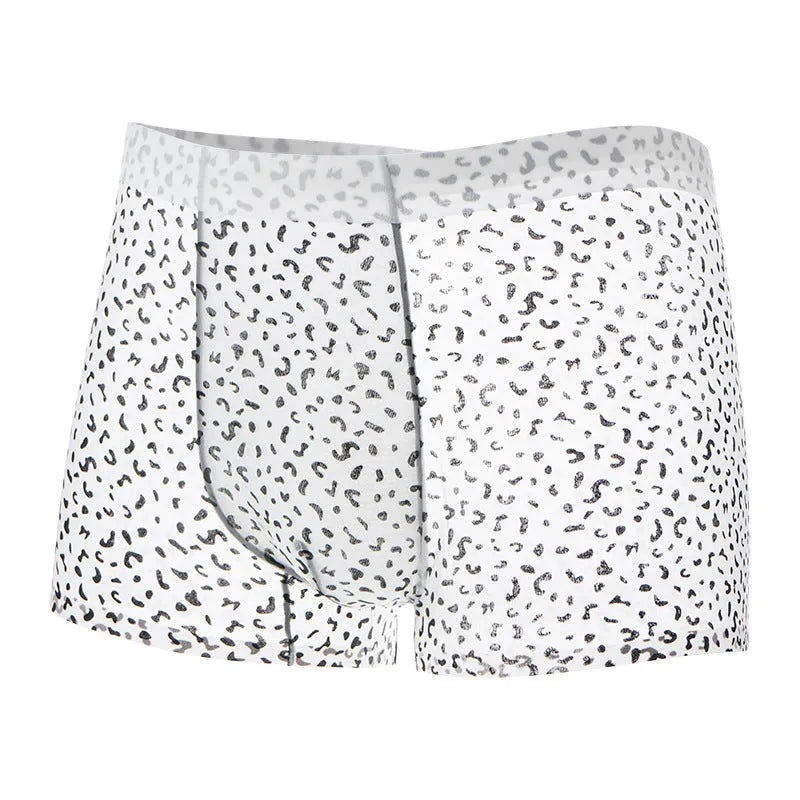 Men's black leopard print ice silk boxers laid flat, showing mid-waist design and knitted fabric texture.