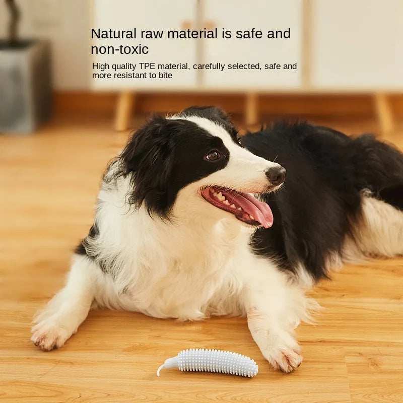Soft green cucumber-shaped dog chew toy for teething and bite-resistant play.
