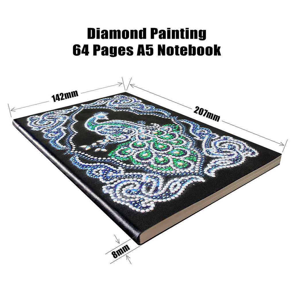 Black A5 diamond painting notebook open, showing journal pages alongside shaped and bright sparkling drills.