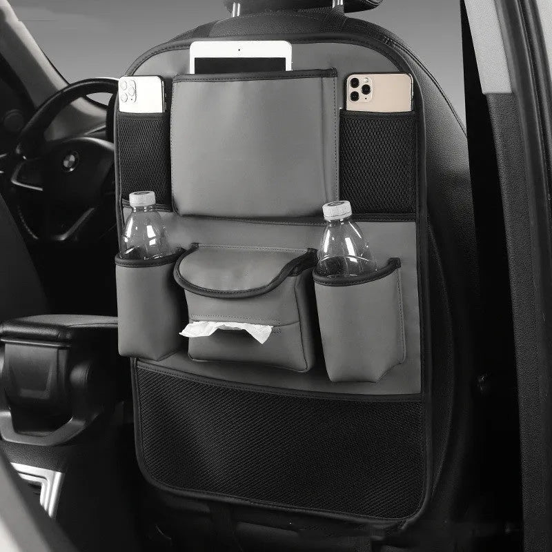 Leather car seat back storage bag in four colour options mounted behind vehicle seat