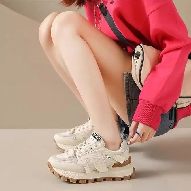 Women's casual platform sneaker in Milky White with front lace-up, flat heel, and round toe