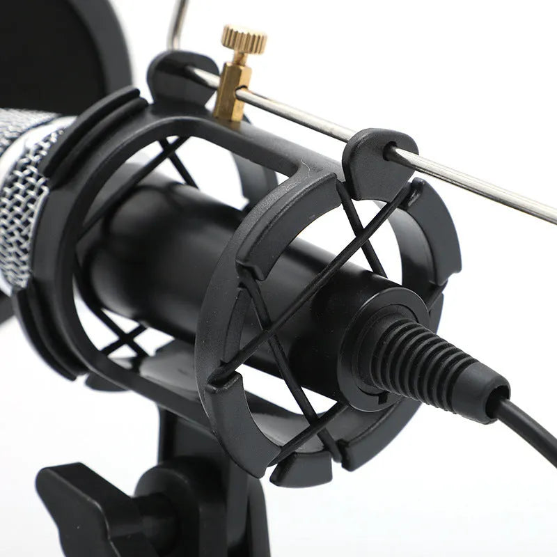 Black mini condenser microphone with aluminium stand and USB/3.5mm cables for live streaming
