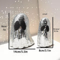 Silver ghost-shaped Halloween desktop decoration with sparkling mosaic mirror patch details.