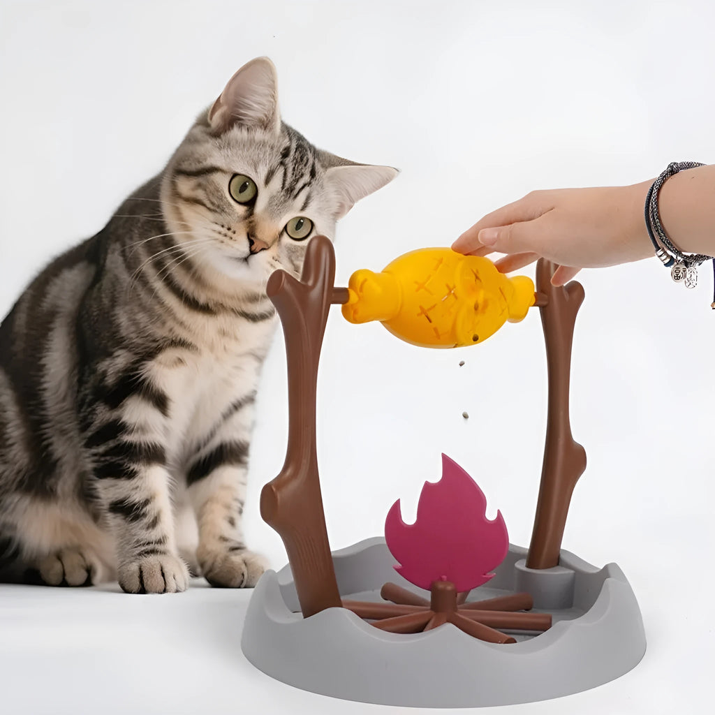 Large barbecue-themed tumbling cat feeder toy on floor, dimensions 30cm by 30cm by 29cm.