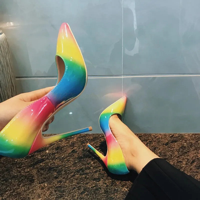 Rainbow multicolour patent leather women's high-heel shoes with pointed toe and stiletto heel.