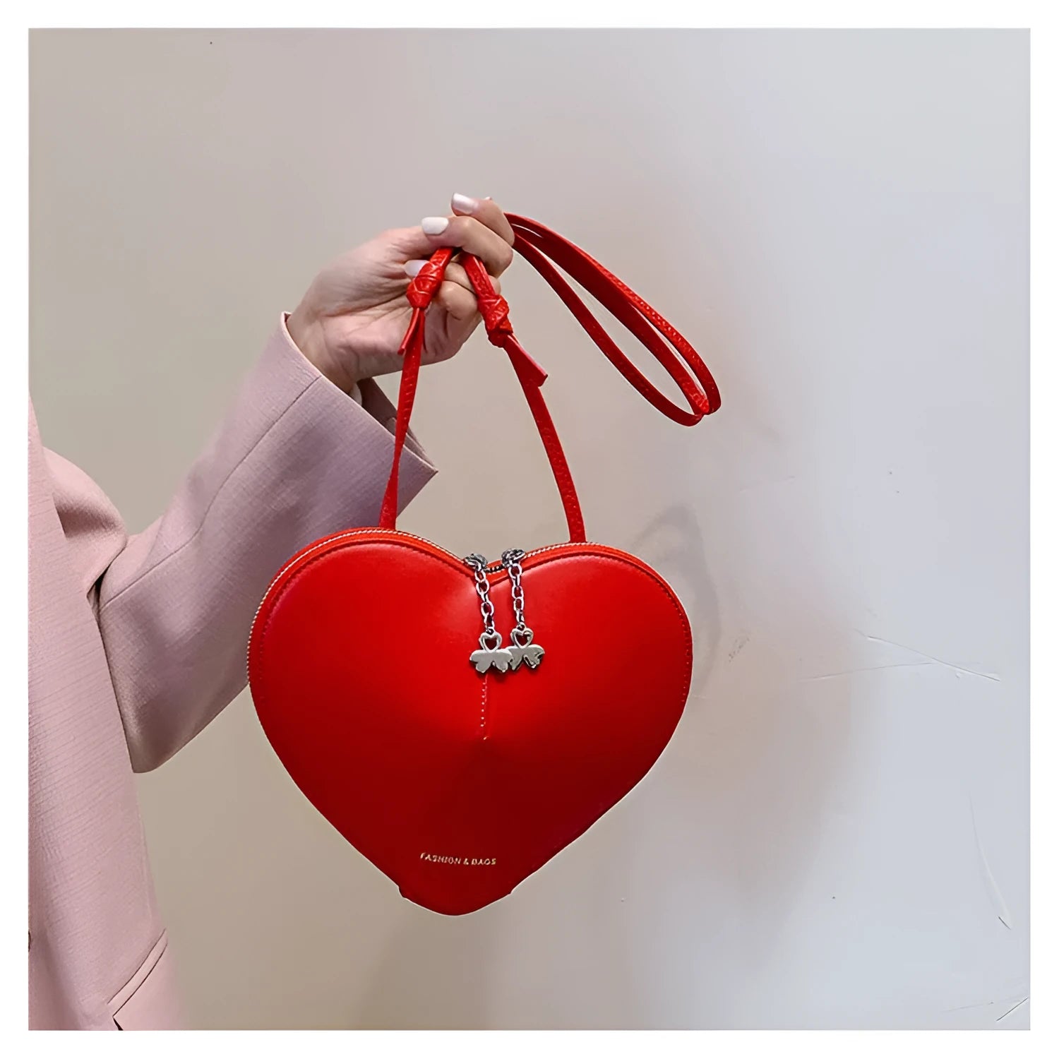 Heart shape women's shoulder bag in milky white PU with single crossbody strap and sewing line detail