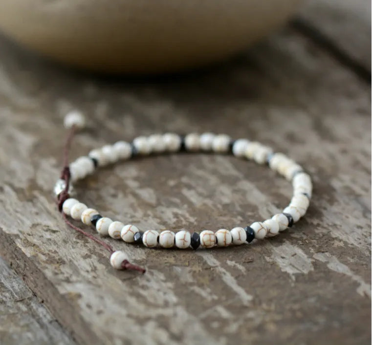 Men's natural gray agate drawing stone turquoise punk bracelet with abacus beads on a neutral background