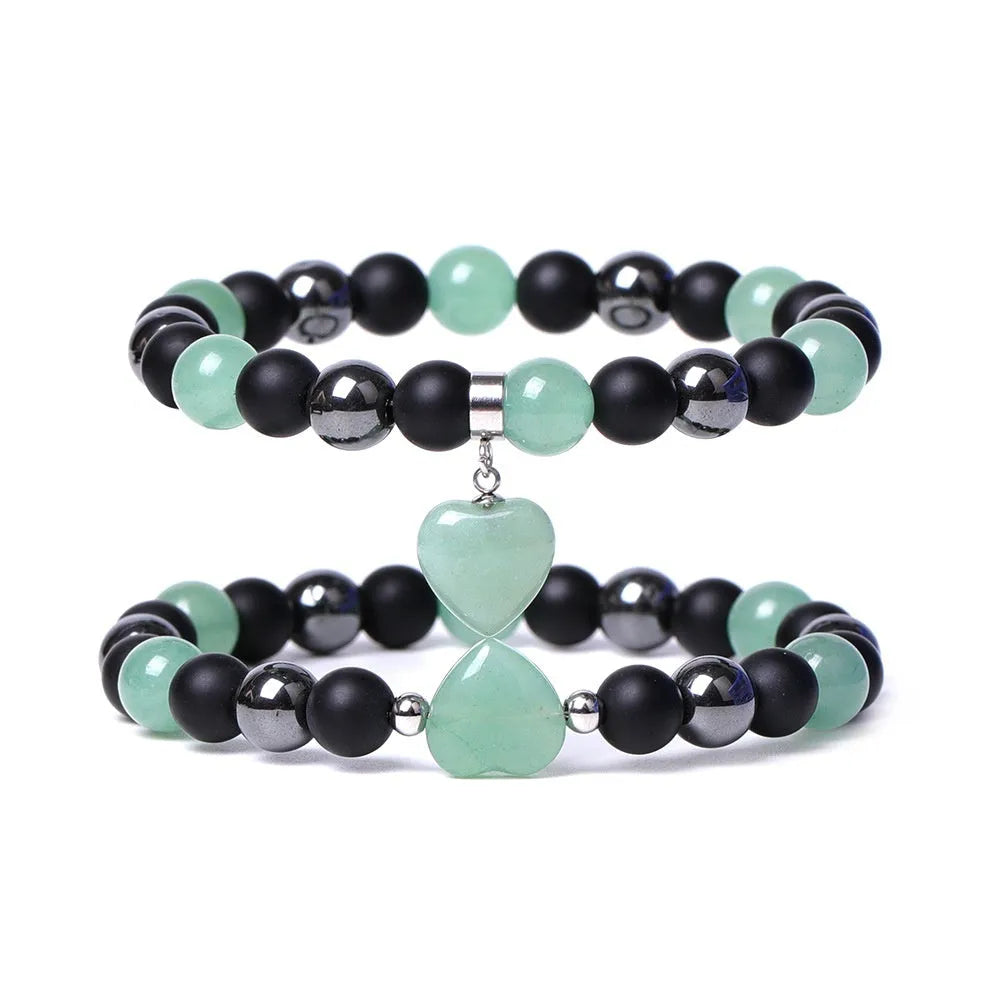 Lvdongling stone bracelet with hand-cut peach heart charm and planetary charms in tigereye colour