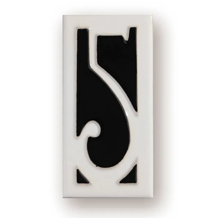Handmade retro-style ceramic doorplate with fired enamel number, shown against a door.