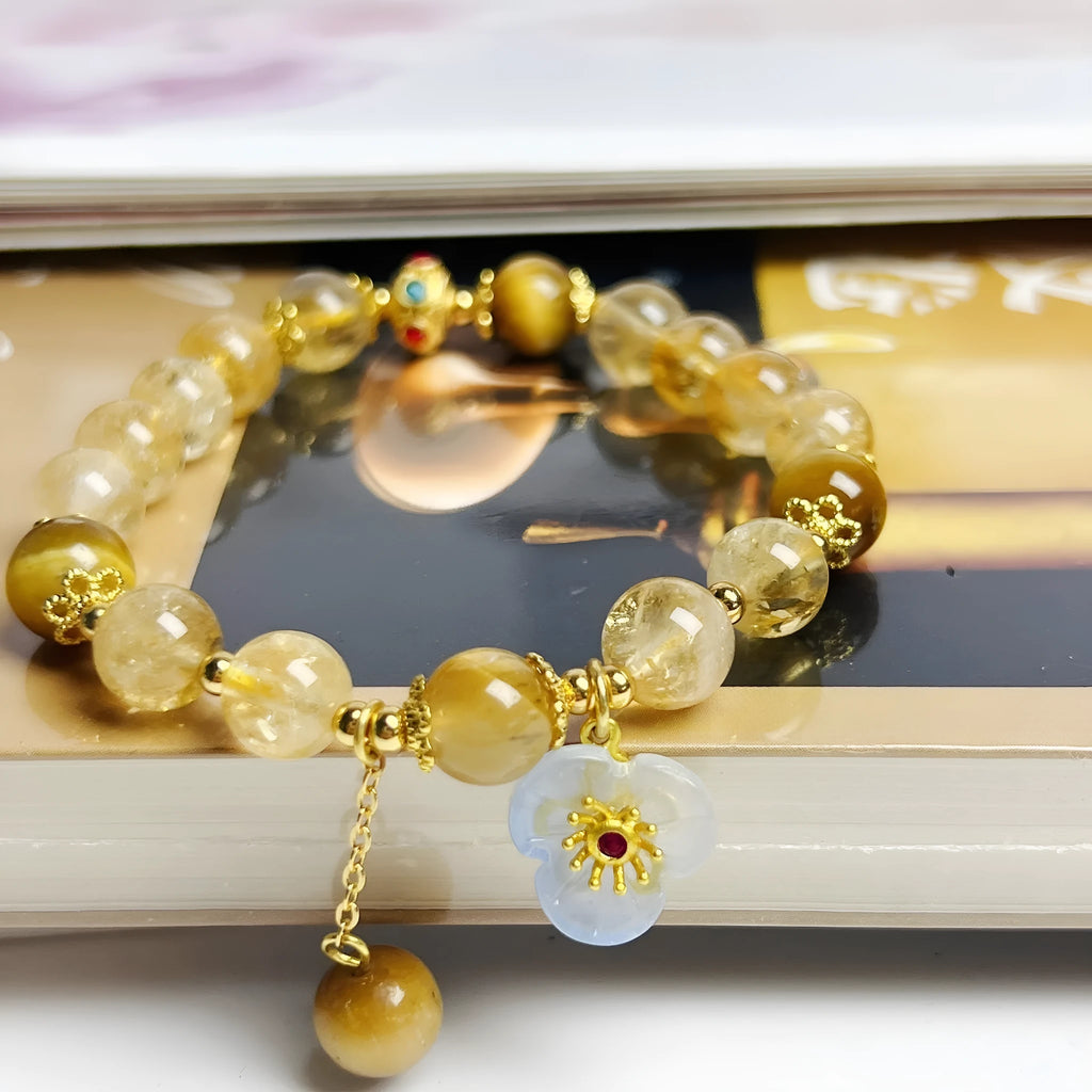 Women's citrine bracelet with floral tassel design, handcrafted crystal jewellery