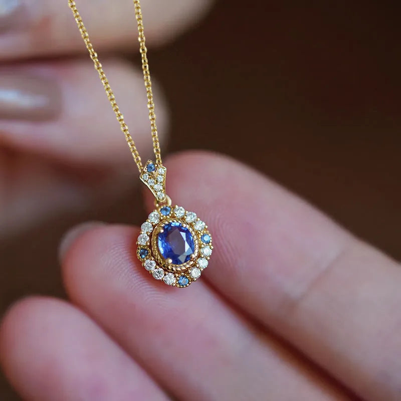 Huitan women's adjustable gold necklace with mixed gem and zircon pendant on a box chain, shown at various lengths.