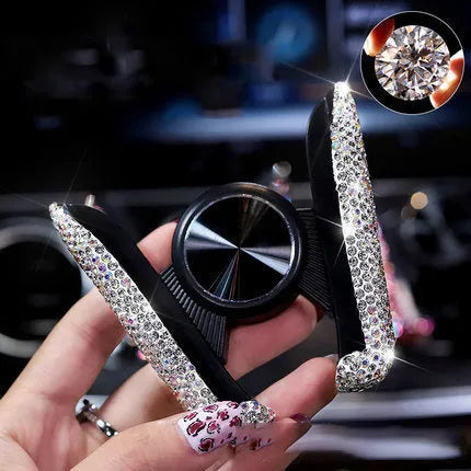 Car buckle mobile phone holder in ABS plastic on a car dashboard with a smartphone in place