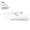 White PU sponge bondage handcuffs and foot cuffs with metal buckles on a nylon strap.