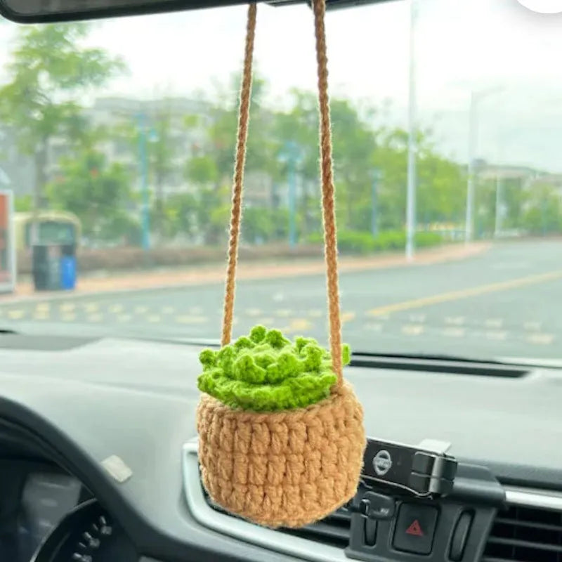 Green and white knitted wool car plant decoration with basin base and hanging rope
