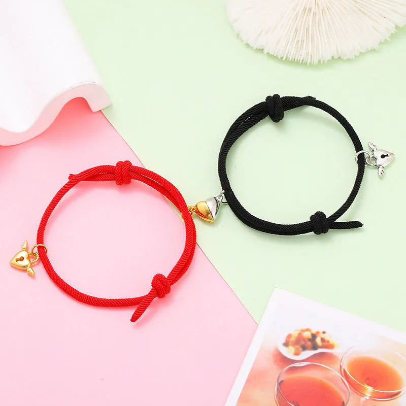 New Love Magnet couple bracelet set, heart-shaped alloy design in black and white, matching pair
