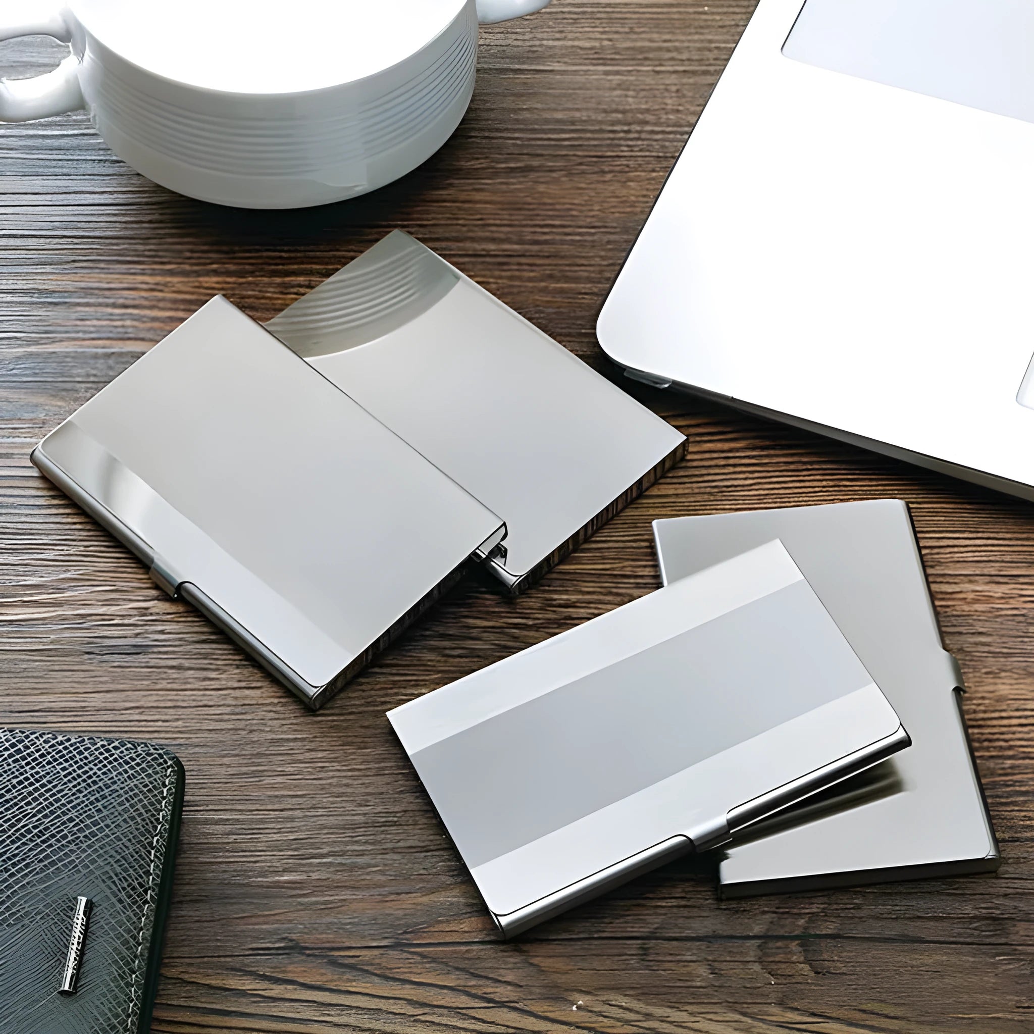 304 stainless steel business card case with geometric laser sculpture design showing horizontal format