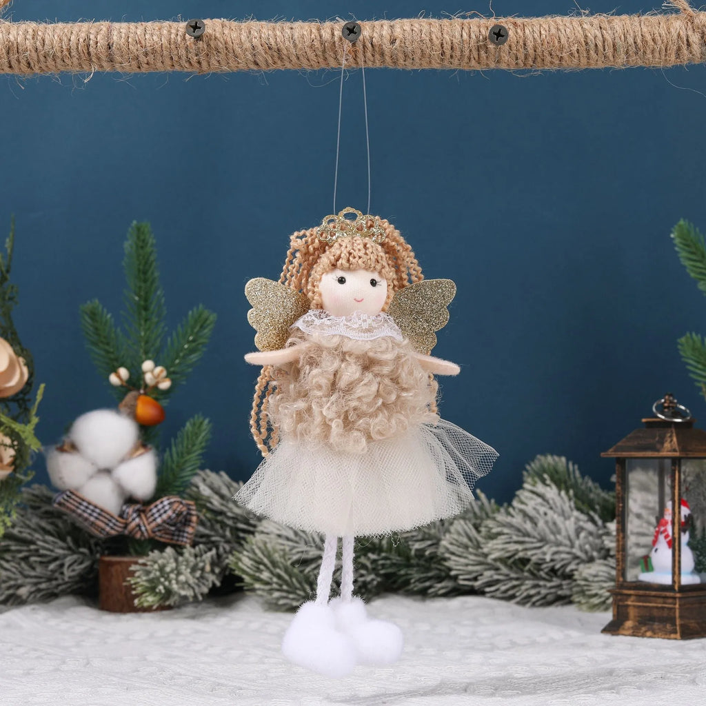 Close-up of a girl's cloth Christmas angel hair pendant clip in white, shown on a high ponytail.