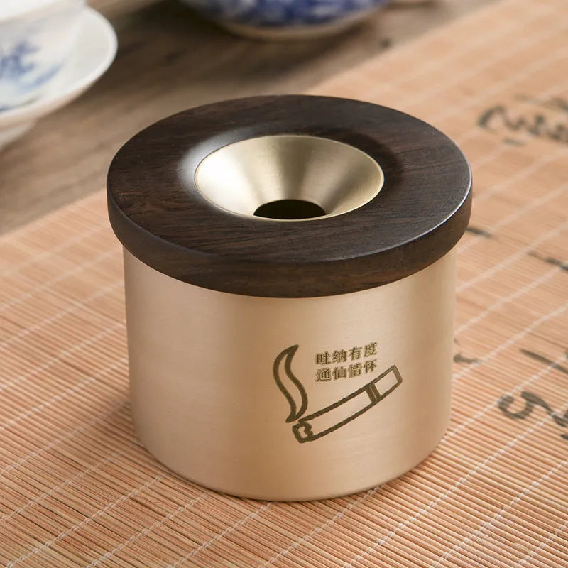 Retro brass ashtray with wooden lid in copper construction for living room use