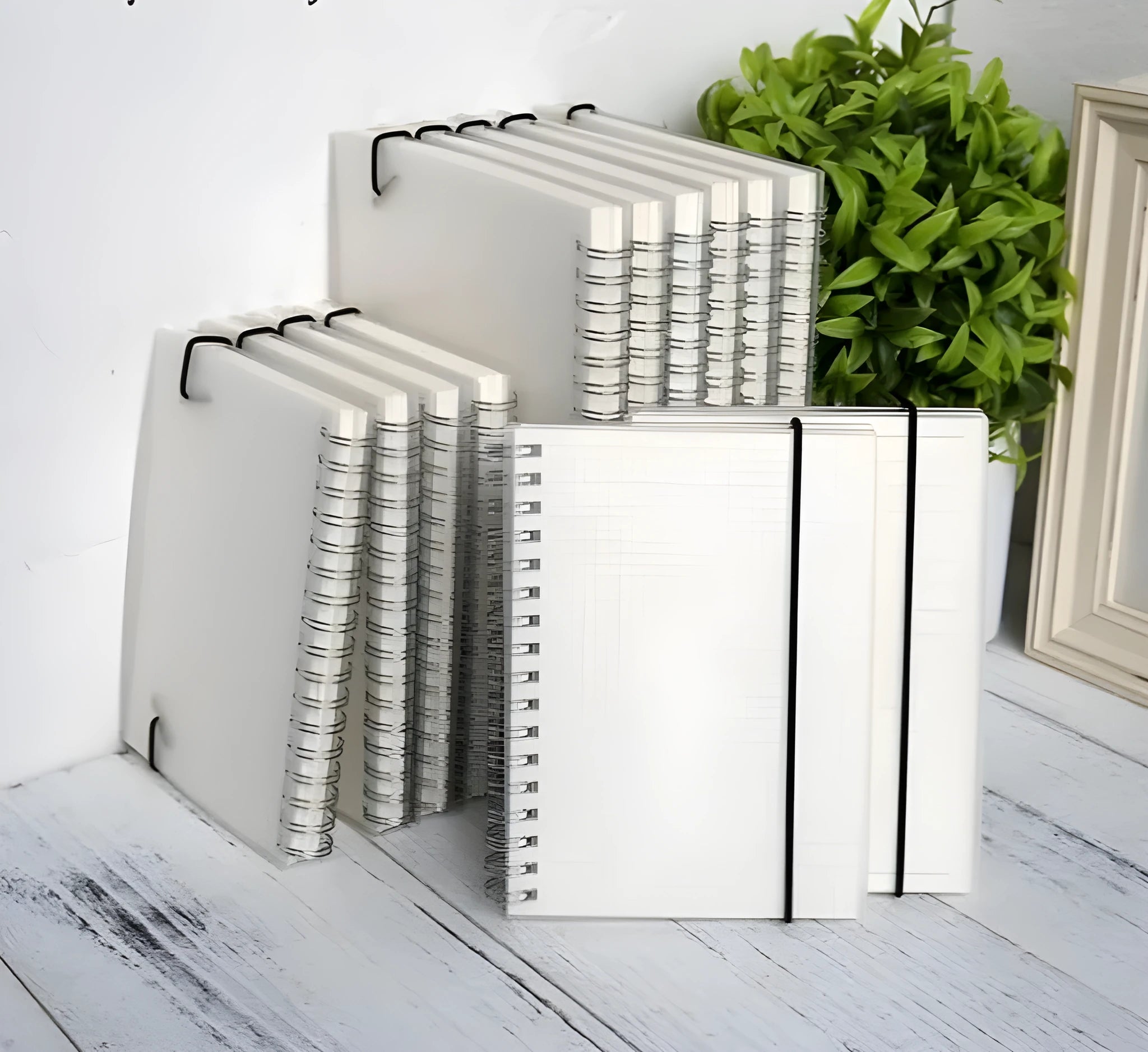 Plastic cover bound spiral coil notebook with transparent PVC cover, elastic rope, and 80 sheets of cream paper in A5 size