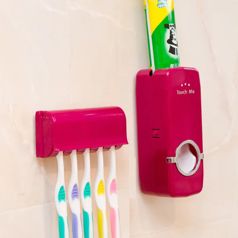 White adhesive plastic toothbrush holder set mounted on a smooth bathroom wall