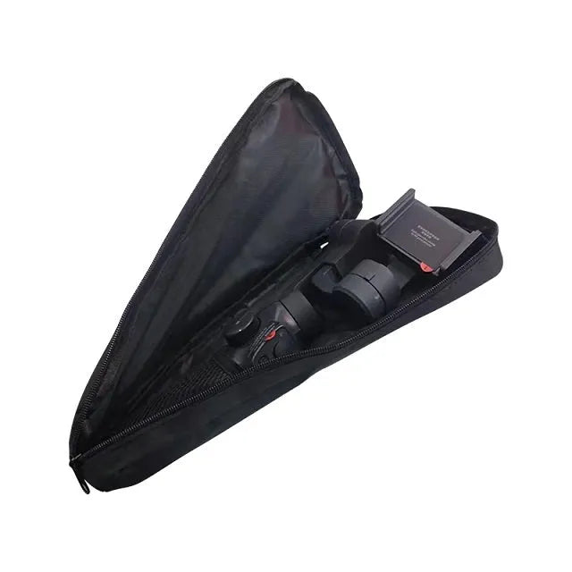 Black drawstring storage bag for mobile phone gimbal accessories on a table.