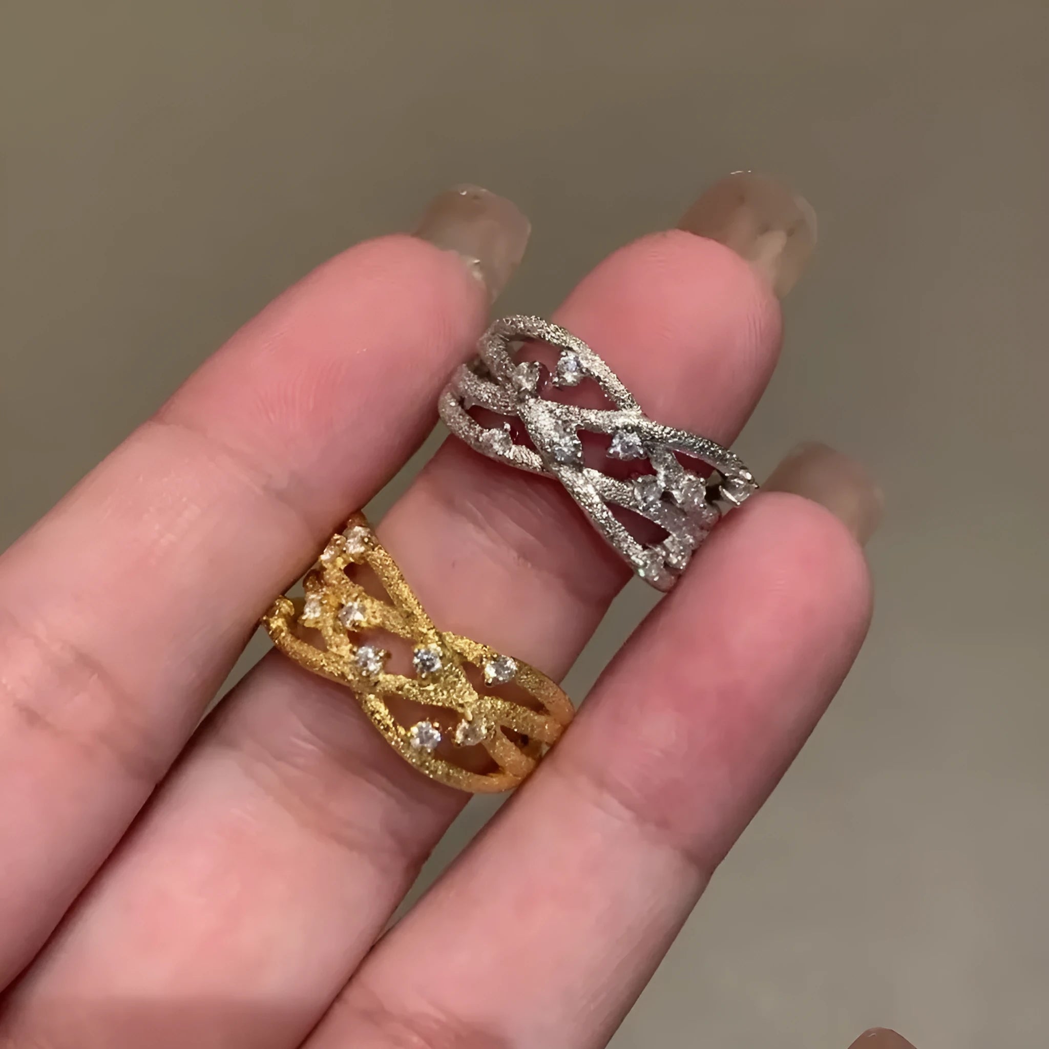 Women's adjustable copper ring with three-dimensional hollow vine cord design in gold electroplated finish