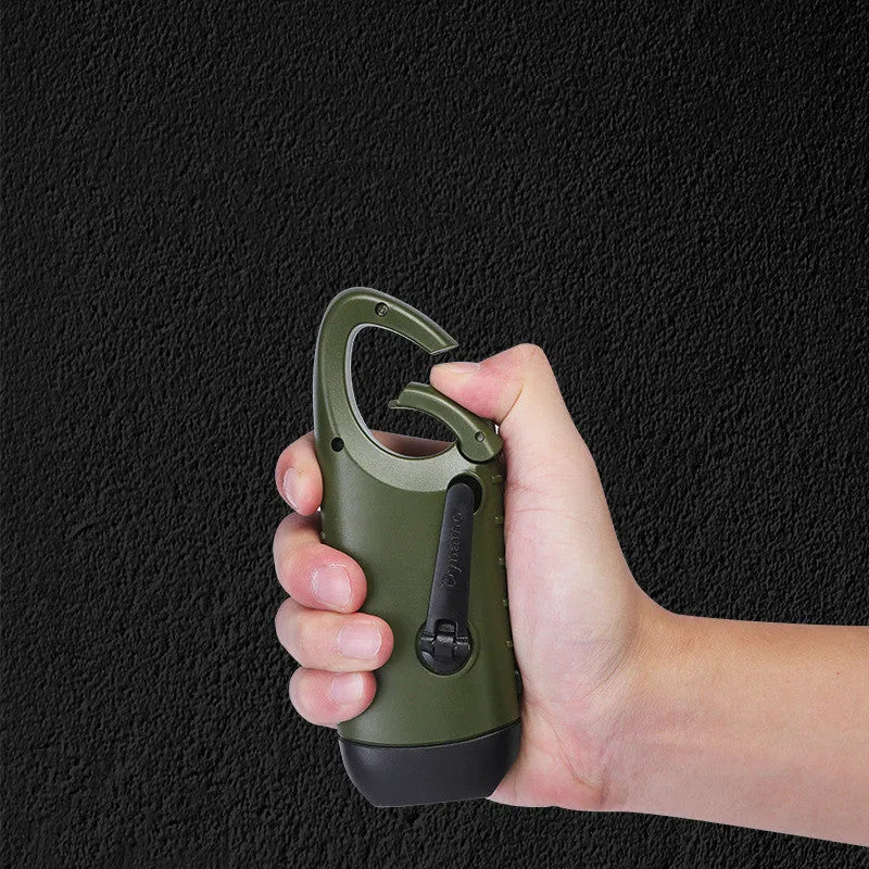 Olive green hand-crank solar LED flashlight with USB charging port on a compact black body.