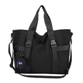 Men's grey Oxford cloth travel shoulder bag showing large main compartment and separate coin purse.
