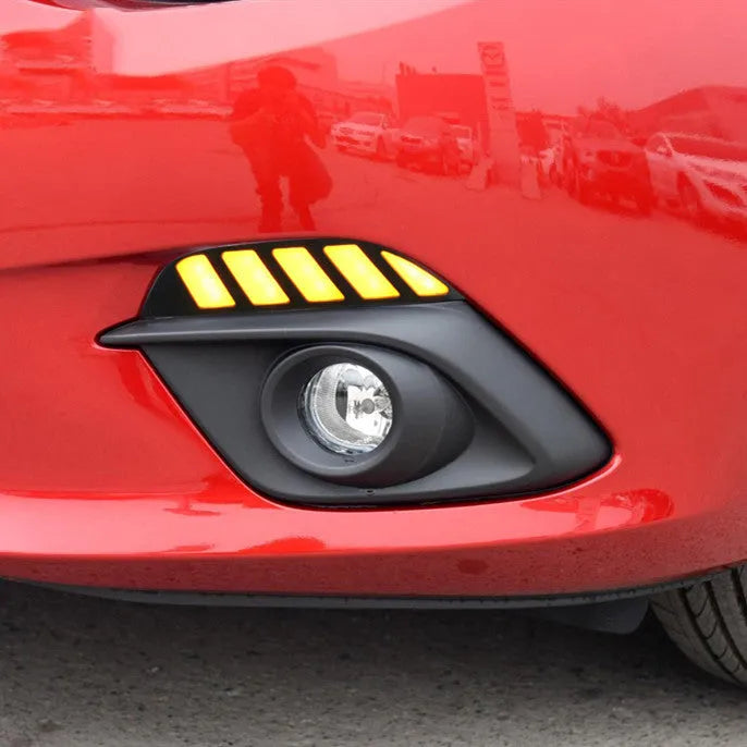 KUST Oncocela LED daytime running light with white and yellow streamer for 14-16 Mazda Enclave front view