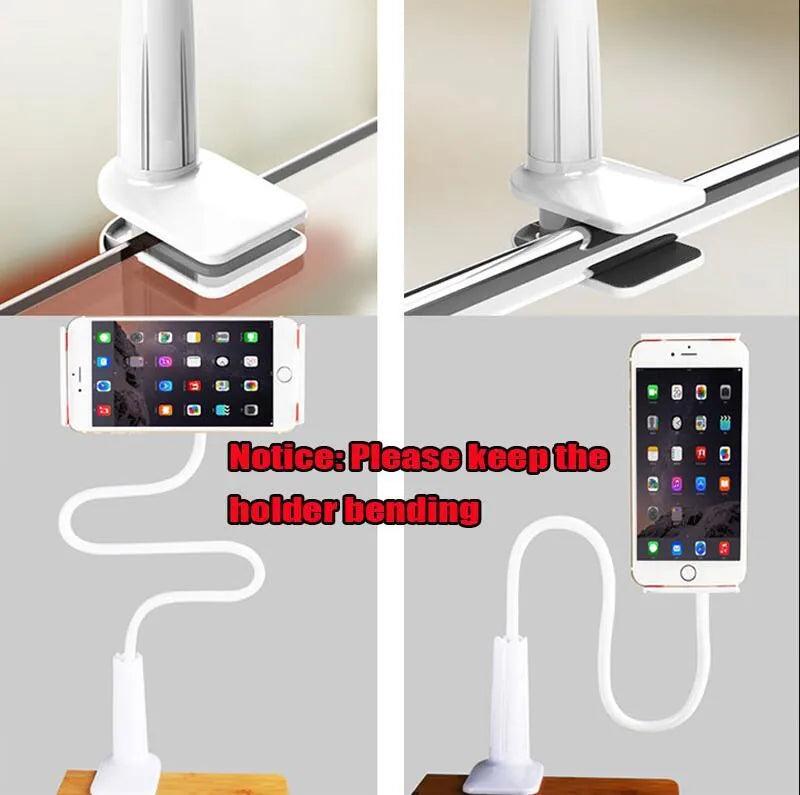 Black bedside phone handset with long adjustable arm and clamp base on a wooden table.