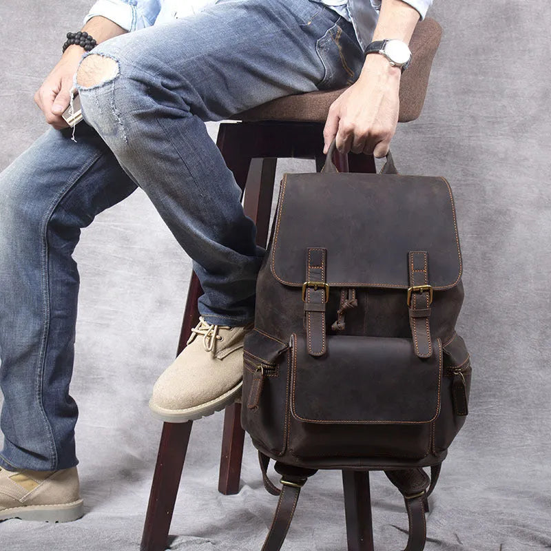 Brown retro crazy horse leather backpack with double shoulder straps and denim interior