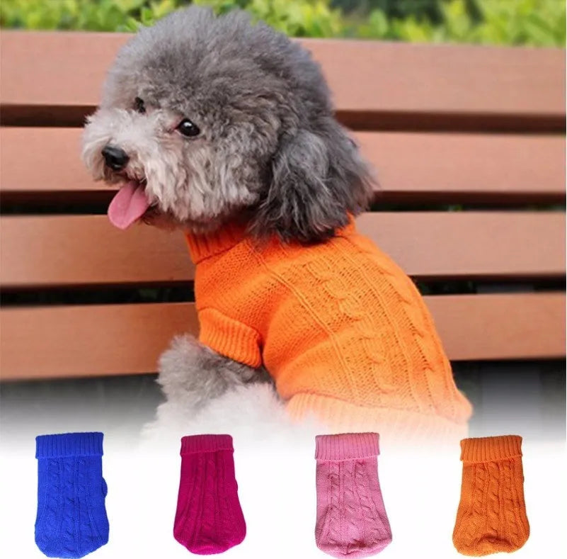 Knitted wool dog sweater with fabric buttons on a white background, shown in blue