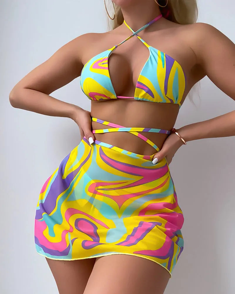 Yellow striped halter-neck swimsuit set for women with lace-up back, skirt, and shorts