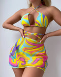 Yellow striped halter-neck swimsuit set for women with lace-up back, skirt, and shorts