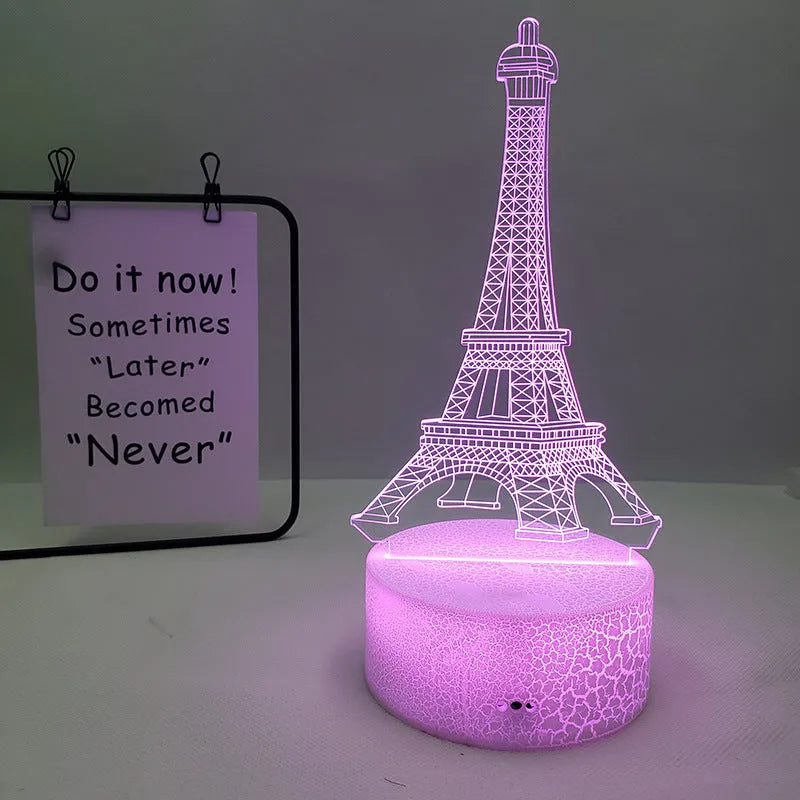Eiffel Tower shaped 3D acrylic table lamp displaying seven colours, with touch controls and remote.