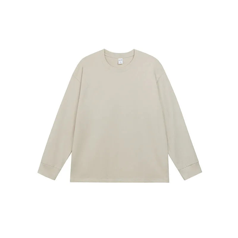 Men's solid colour pure cotton long-sleeved t-shirt shown in loose fit on a hanger.