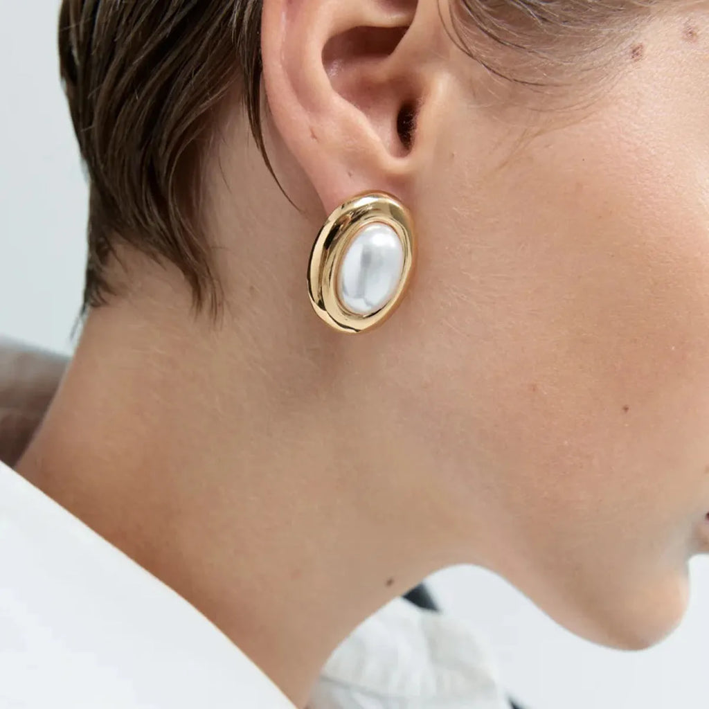 Stainless steel vintage pearl ear studs for women with silver tone finish and electroplated surface