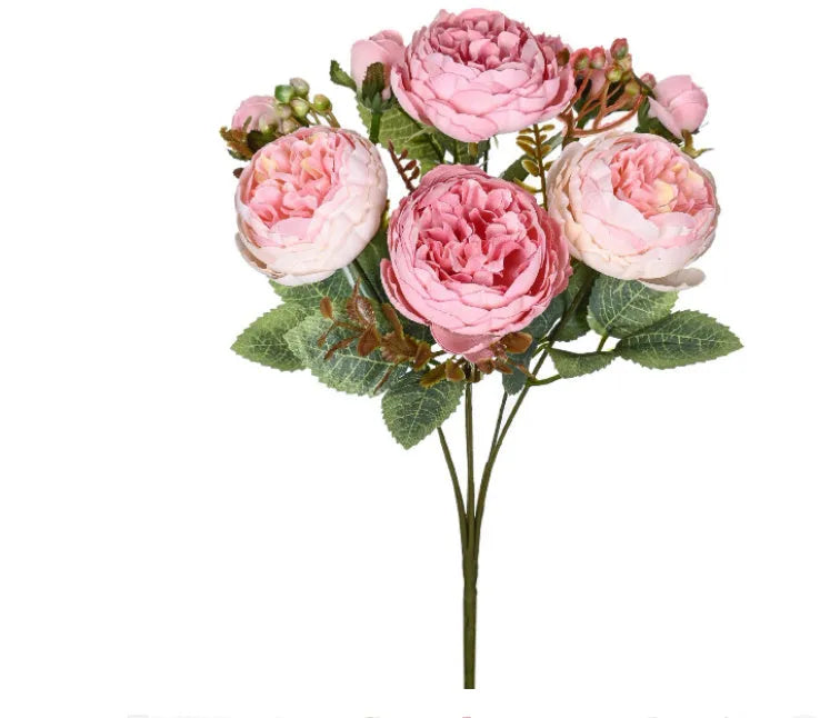 Artificial silk peony bouquet in a vase, showing realistic pink and champagne coloured blooms for home decor.