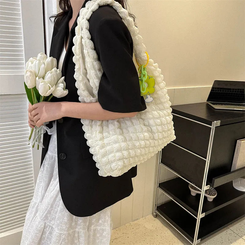 Women's pleated bubble crossbody bag in soft polyester with pendant accessory in vertical square design