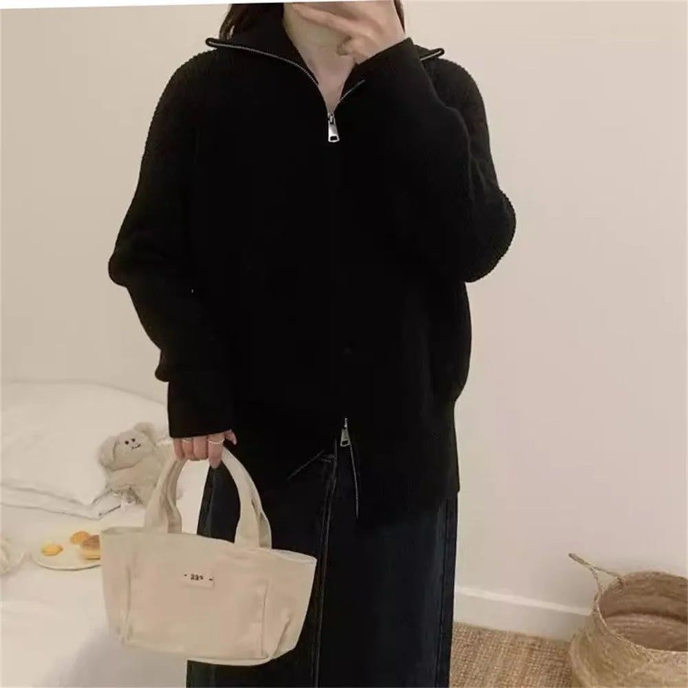 Hong Kong style grey double zipper knitted cardigan jacket with a floral pattern, shown on a model.