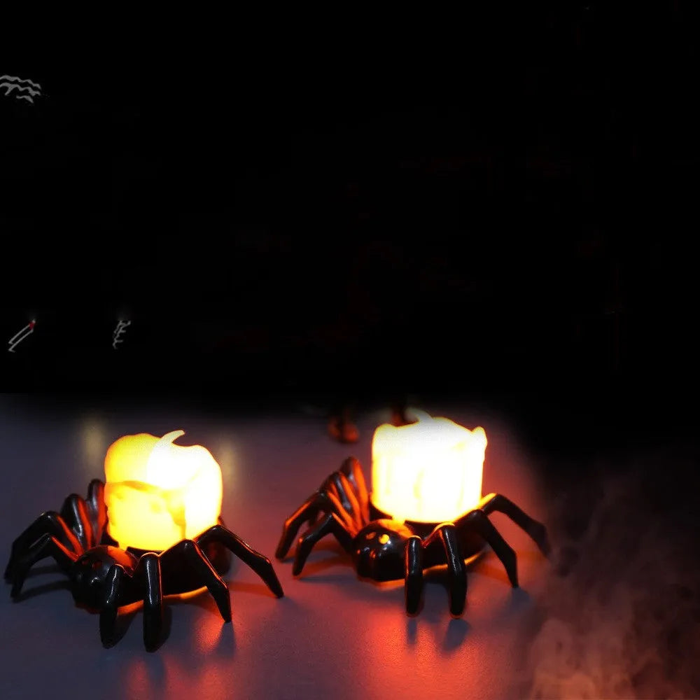 Plastic Halloween spider candlestick ornament with battery-operated candle light.