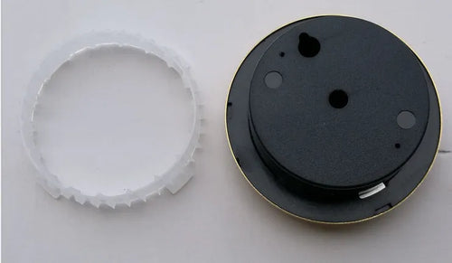 White analog thermometer and hygrometer with aluminium ring and dial for indoor and outdoor use.