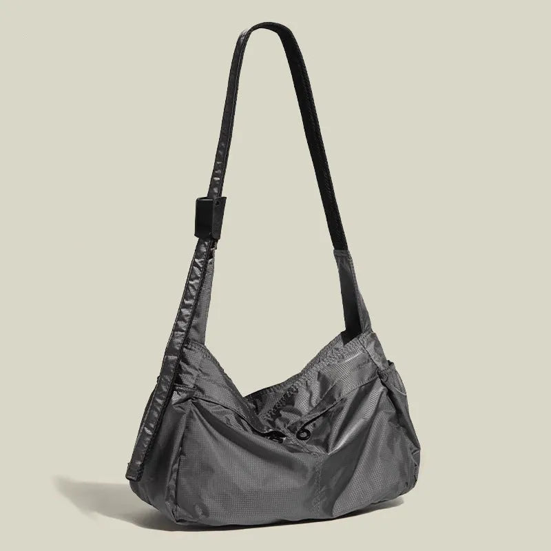 Nylon waterproof messenger bag in horizontal square shape with shoulder strap
