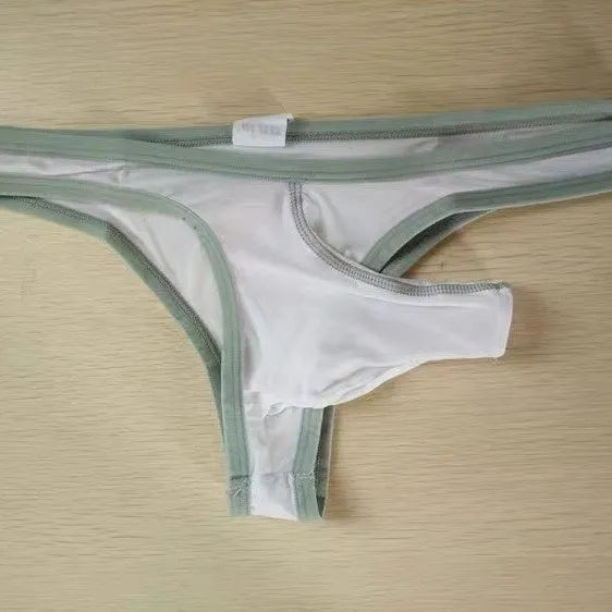 Men's white Ice Silk nylon briefs on a grey background, showing the elephant nose front pouch design.